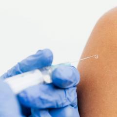 Person receiving a vaccine