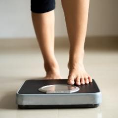 Person standing on a scale 