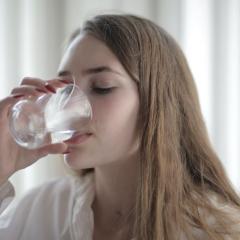 Woman drinking glass of water